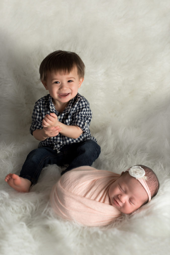 Big Brother Sibling poses Charlotte Newborn Photographer