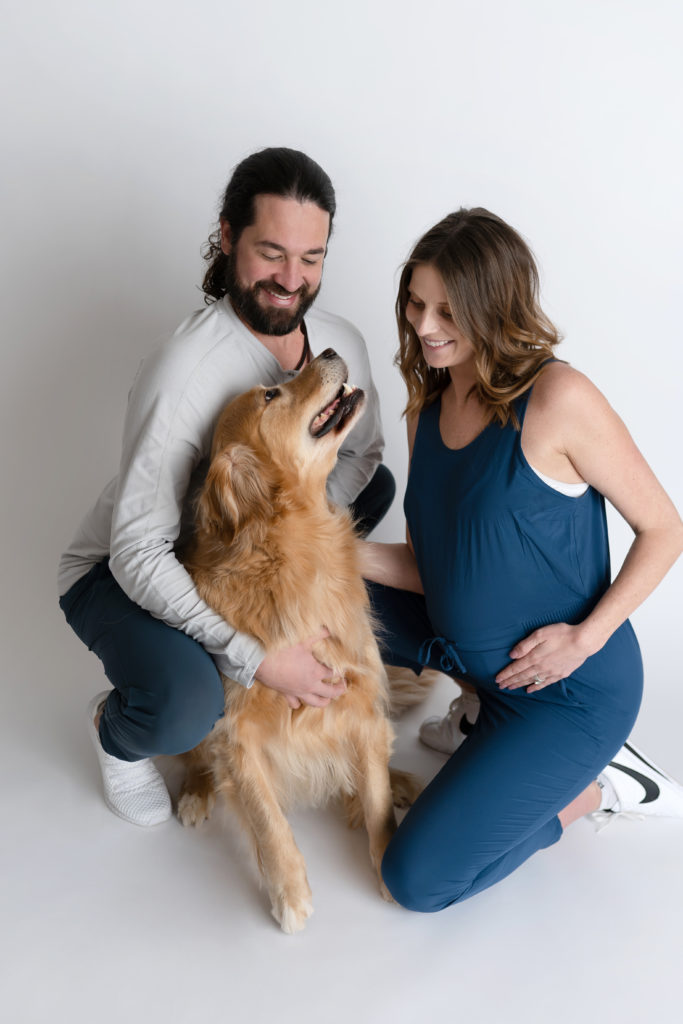 family dog joins for photo in studio