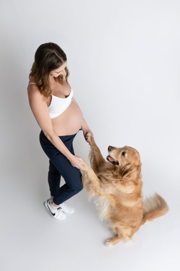 new mom with dog waiting for baby