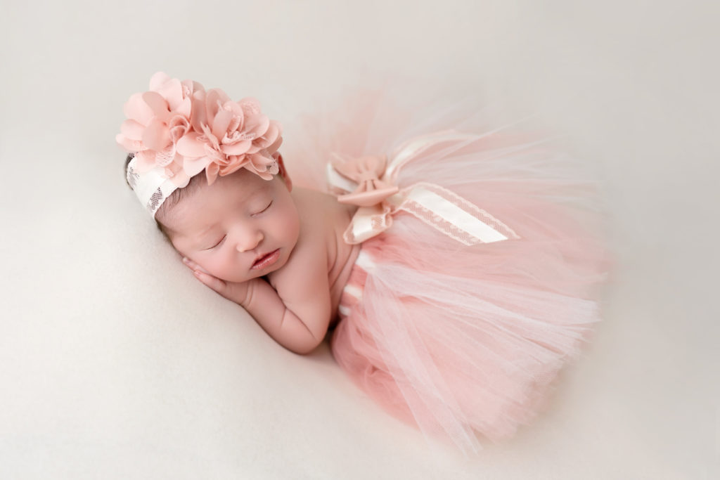 gorgeous dress on baby girl for newborn photography shoot in Charlotte