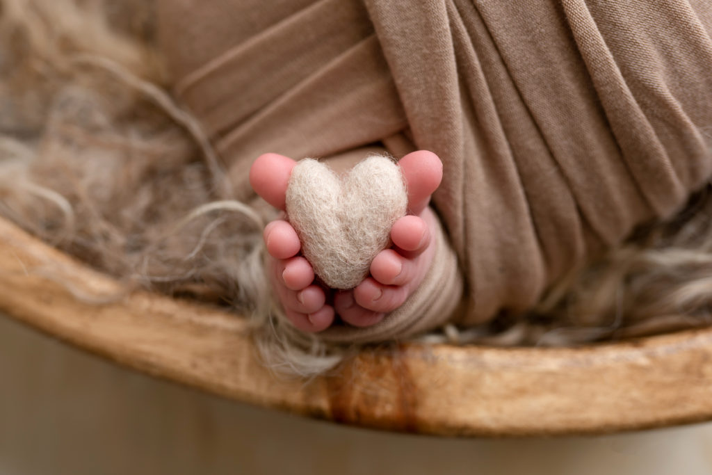 baby toes posed with heart for newborn session in Charlotte studio