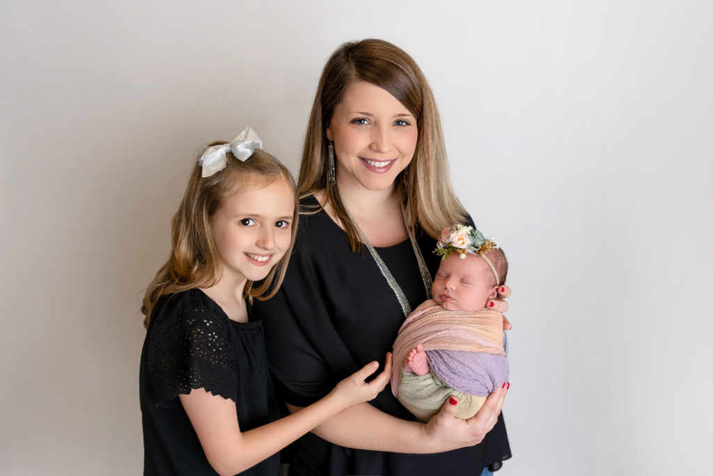 New mother with daughter and newborn just girls wearing black