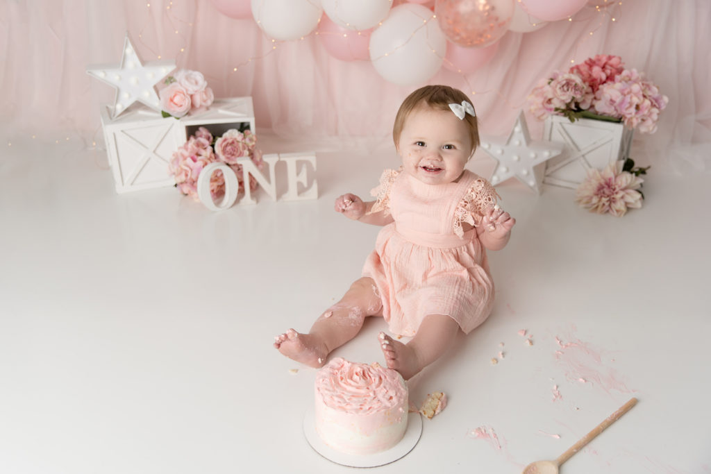 baby girl pink cake smash