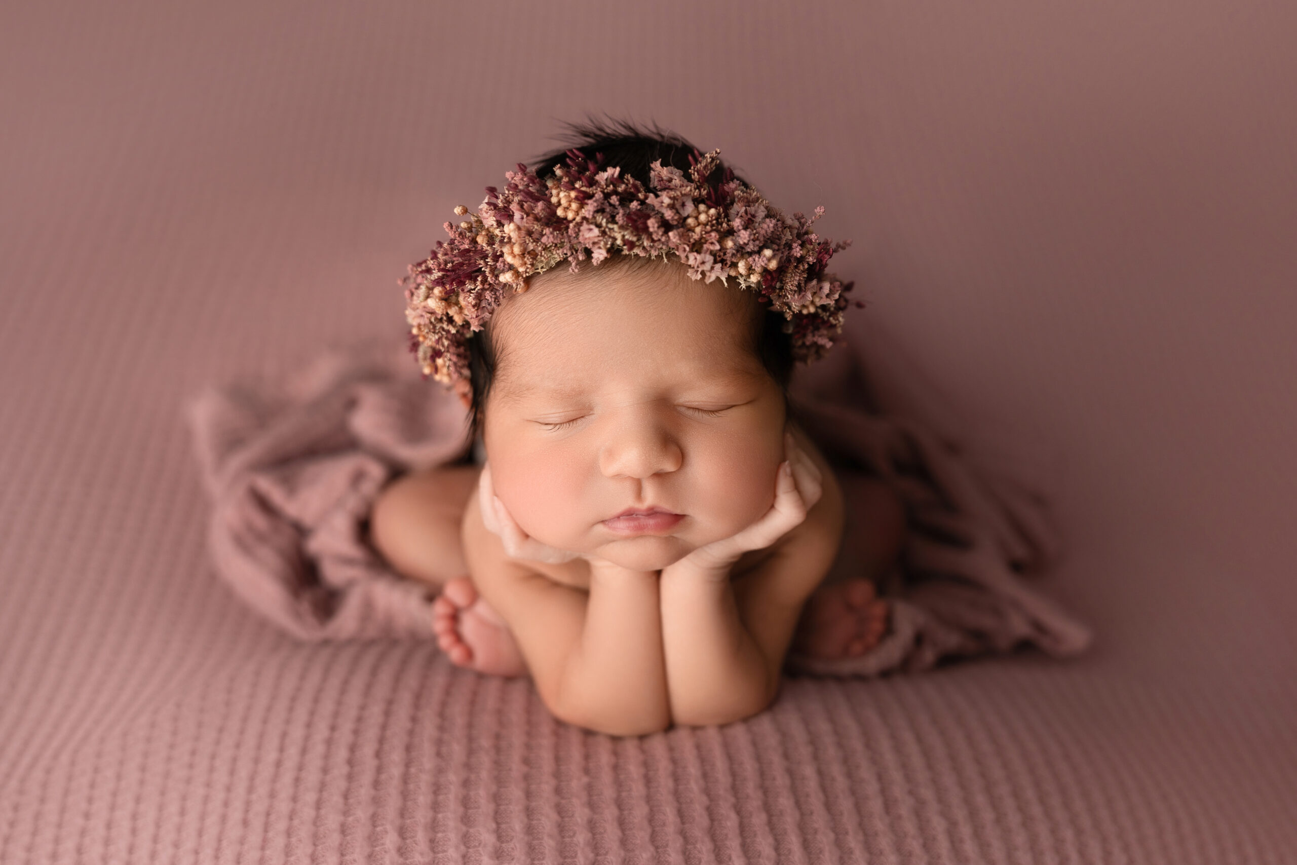 newborn girl in pink session