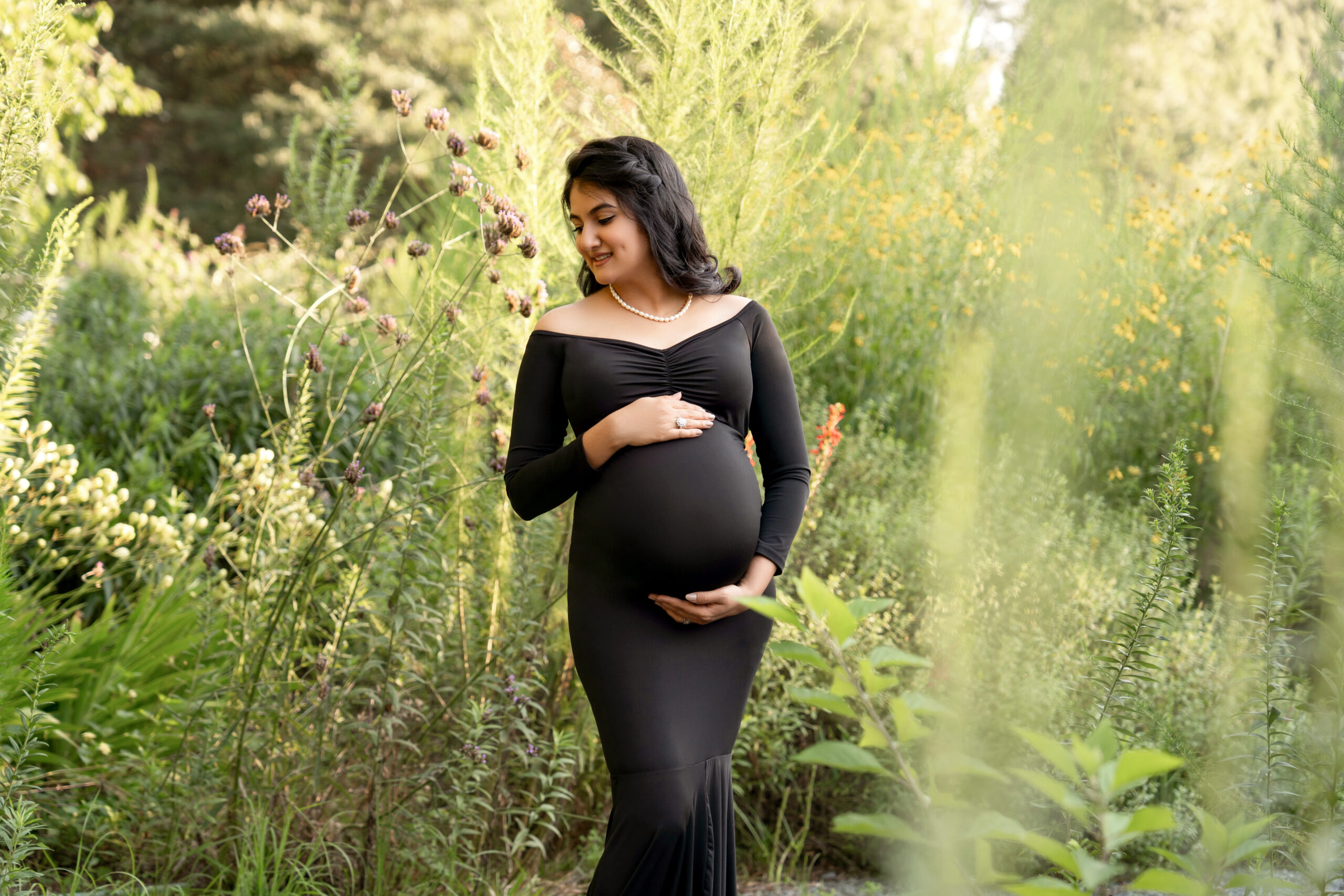 black dress maternity outdoor photoshoot