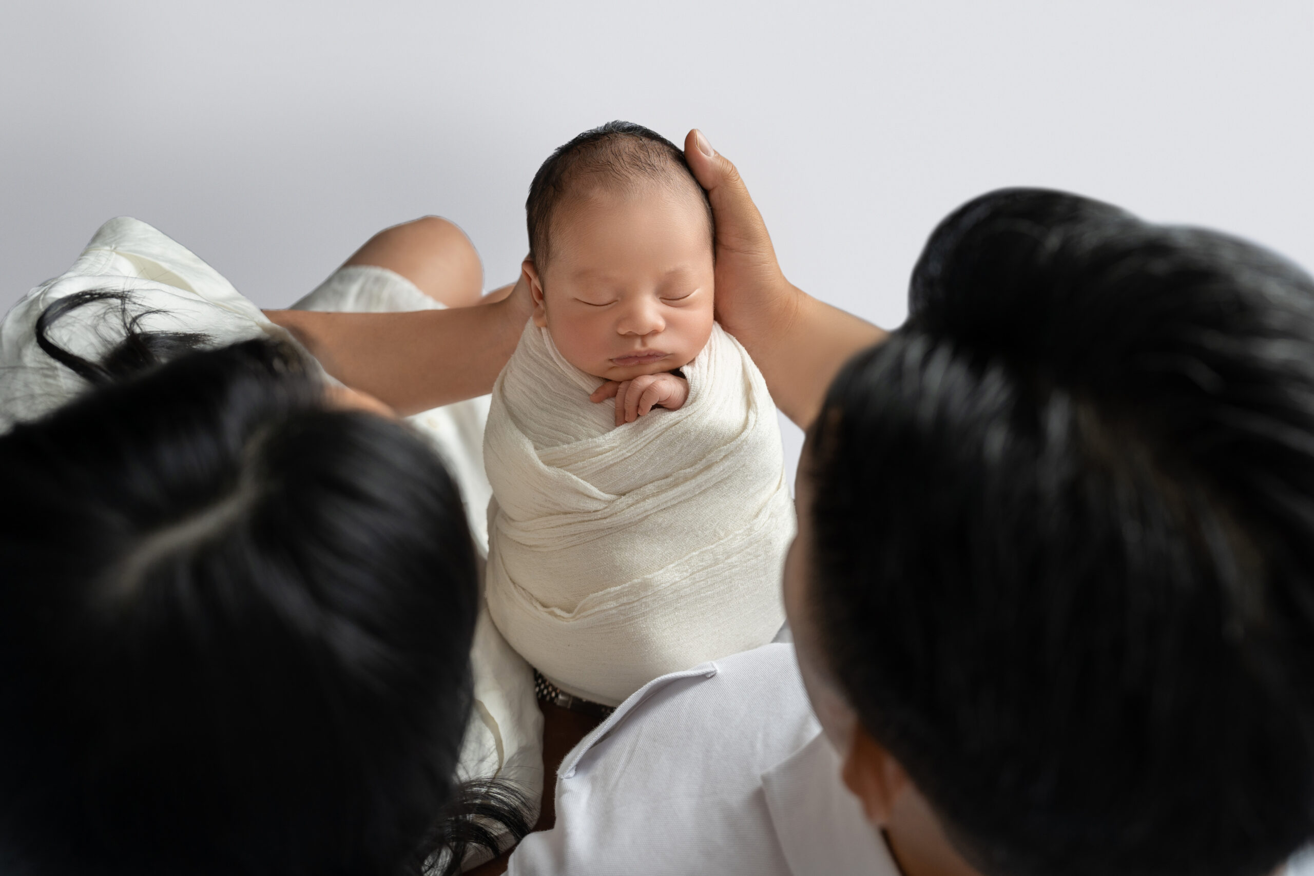 newborn boy in simple photoshoot