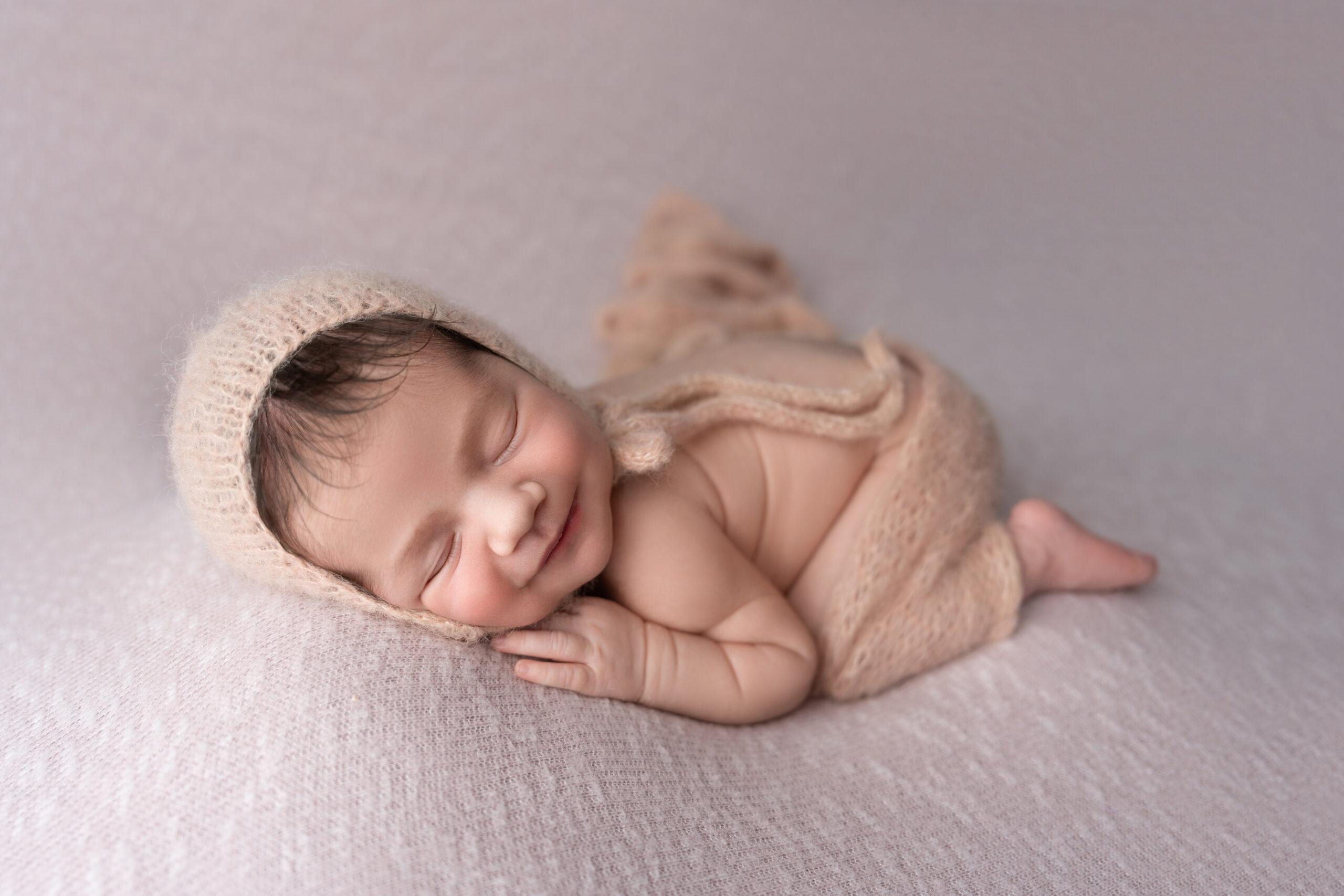 pink and white newborn photography session